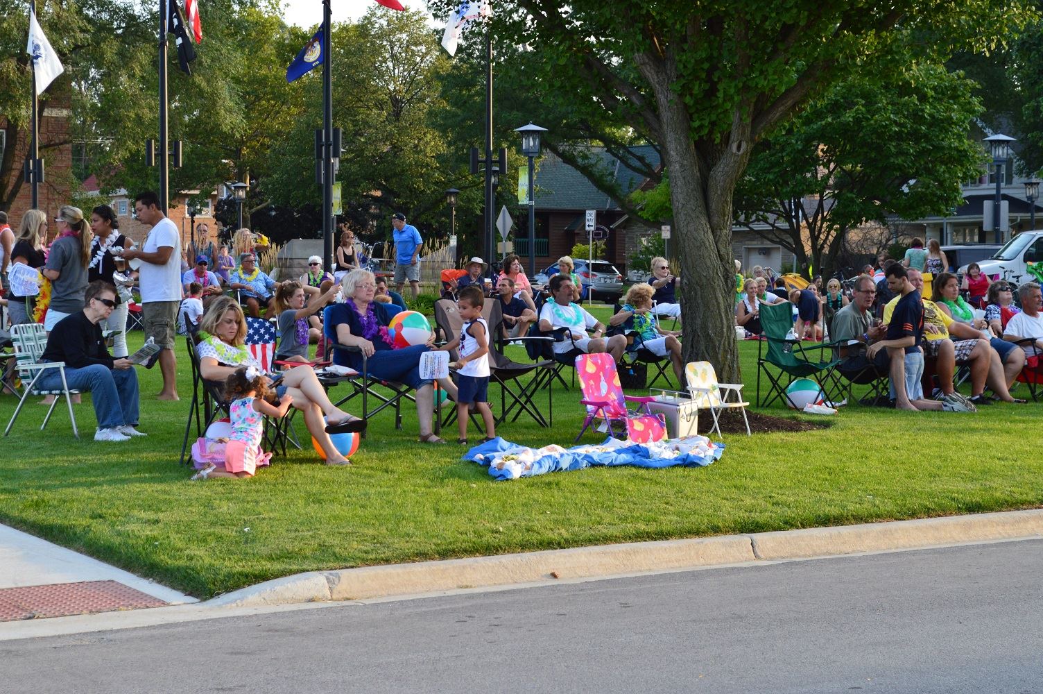 Community members sit on blankets and chairs at Cortesi Veterans Memorial Park to watch Mr. Meyers band perform Aug. 4, 2016.